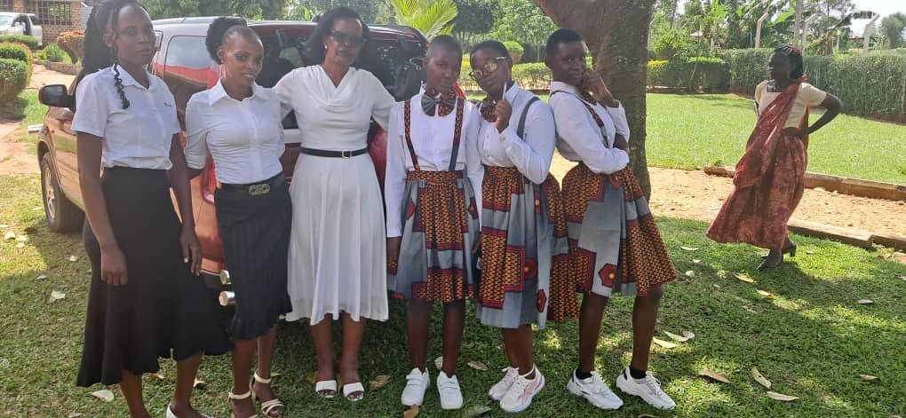Pastor Annet K. Ssesanga with young people of Vvumba Life of Faith Ministries